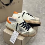 Super-Star with silvery matte cowhide star and orange matte cowhide leather heel