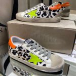 Super-Star with yellow matte cowhide star and orange matte cowhide leather heel