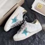 Super-Star with green suede leather star and golden matte cowhide leather heel