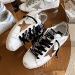 Super-Star with brown matte cowhide star and black and golden glitter heel