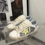 Super-Star with yellow matte cowhide star and blue matte cowhide leather heel