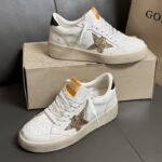 Ball-Star with golden glitter star and black glitter heel