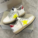 Ball-Star with yellow matte cowhide star and red matte cowhide leather heel