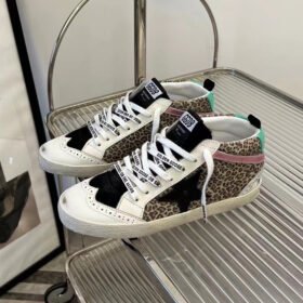 Mid Star with black matte cowhide star and green matte cowhide leather heel